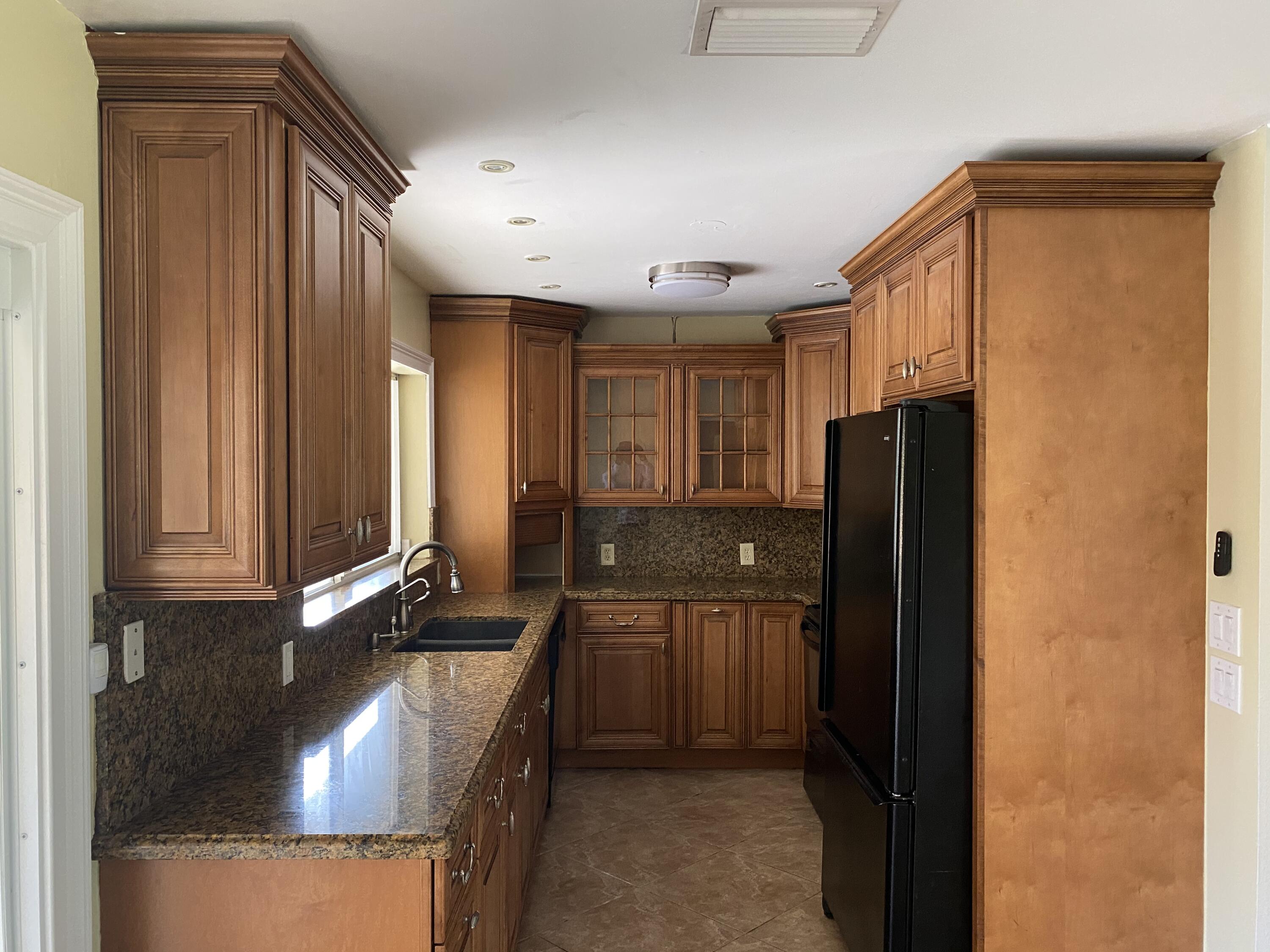 7086 Lawrence Road Boynton Beach, FL 33436 - Photo 7 of 16 IMG_1229