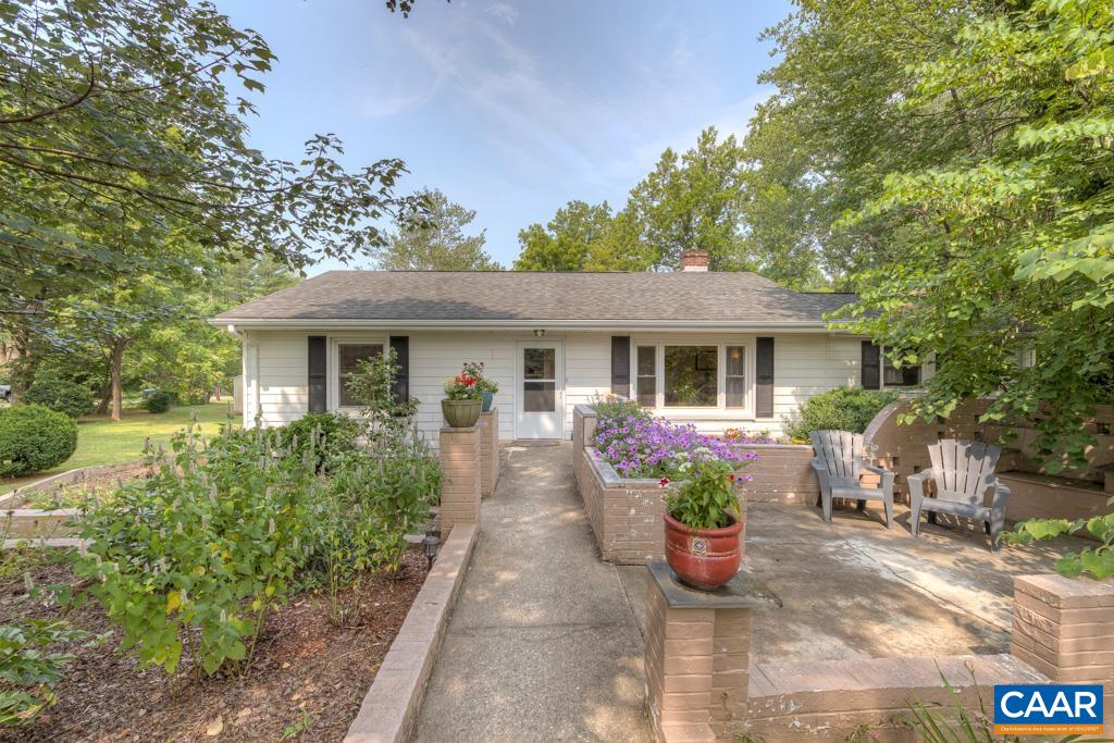 1935 Lambs Road Charlottesville, VA 22901 - Photo 1 of 24 a front view of a house with garden