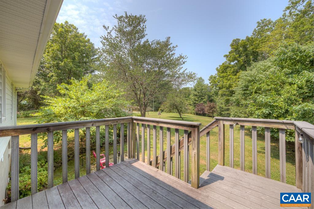 1935 Lambs Road Charlottesville, VA 22901 - Photo 16 of 24 a balcony with wooden floor and outdoor space
