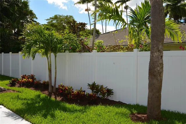 a view of a swimming pool with a backyard