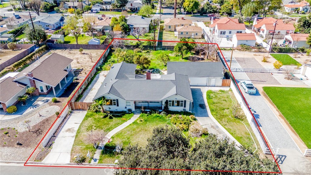 3698 McKinley Street Riverside, CA 92506 - Photo 1 of 1 an aerial view of a house with a swimming pool yard and outdoor seating