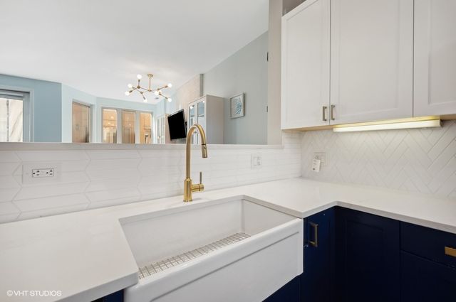 a bathroom with a sink and a bathtub