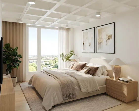 a bedroom with a large bed and a large window