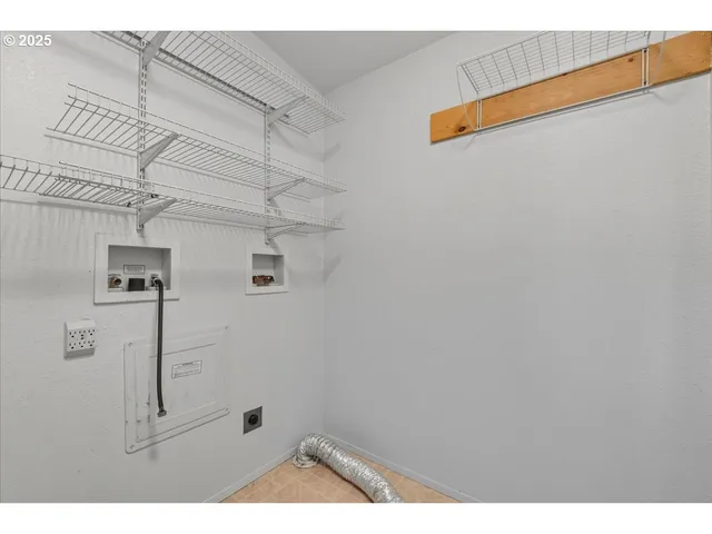 a bathroom with a granite countertop sink toilet a mirror and shower