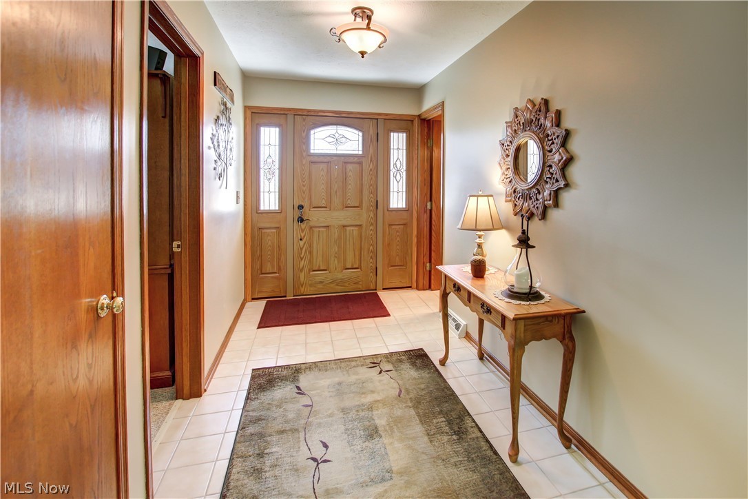 1010 Rustic Trail Cleveland, OH 44134 - Photo 14 of 49 Foyer entrance with light tile floors