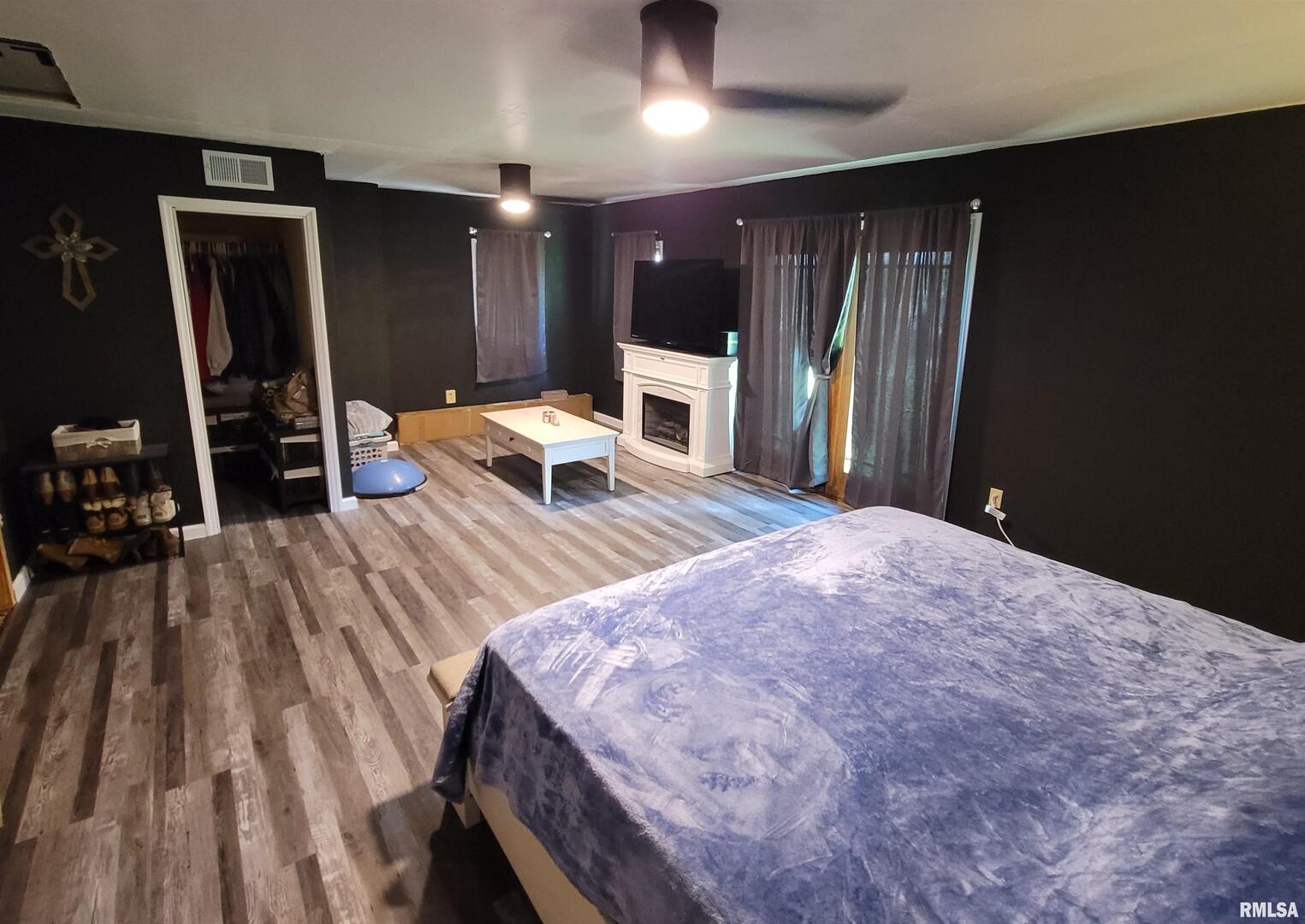3993 Greenridge Road Alma, IL 62807 - Photo 18 of 45 a bedroom with a bed and a large mirror