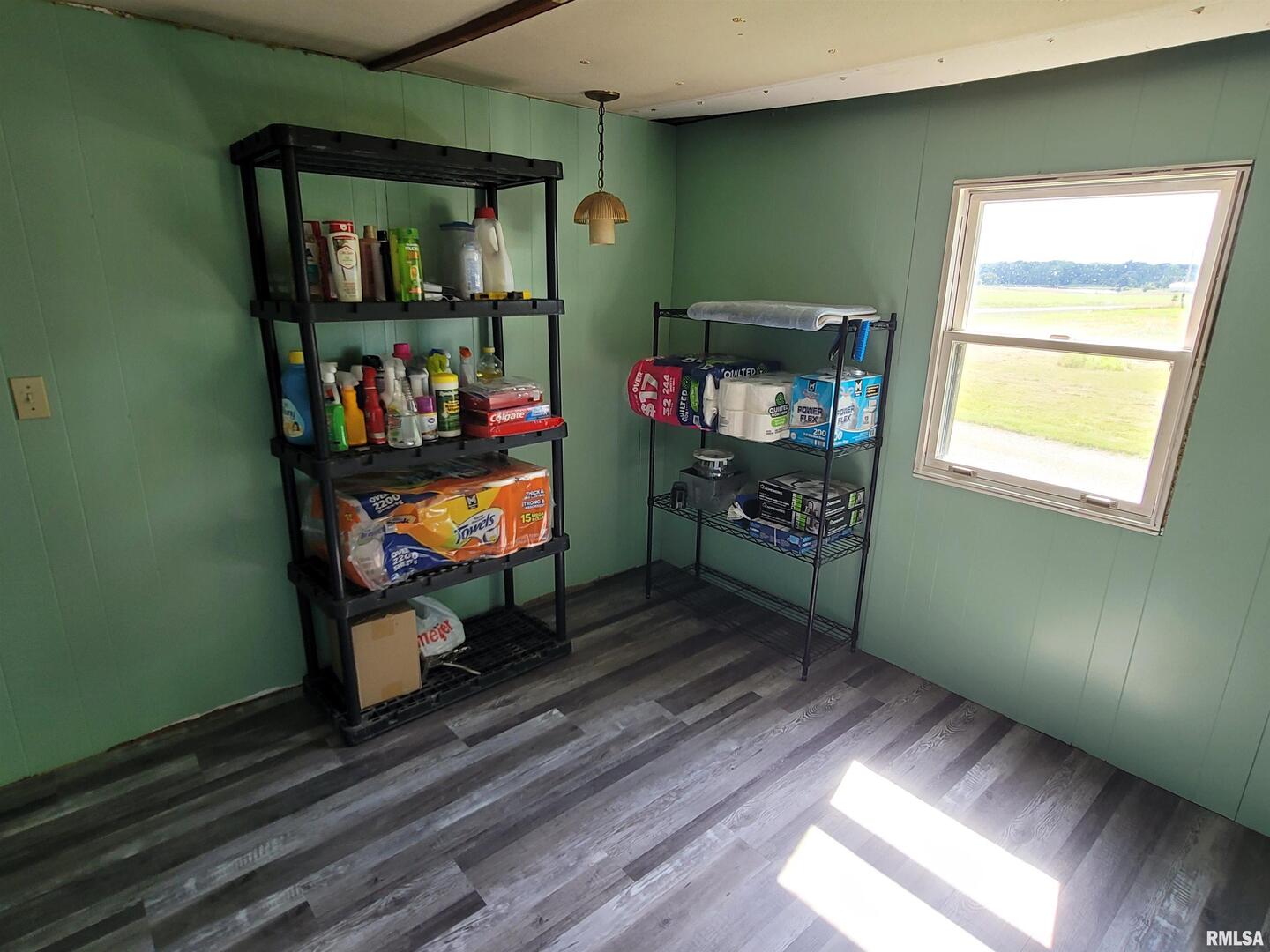 3993 Greenridge Road Alma, IL 62807 - Photo 28 of 45 a room with wooden floor and window