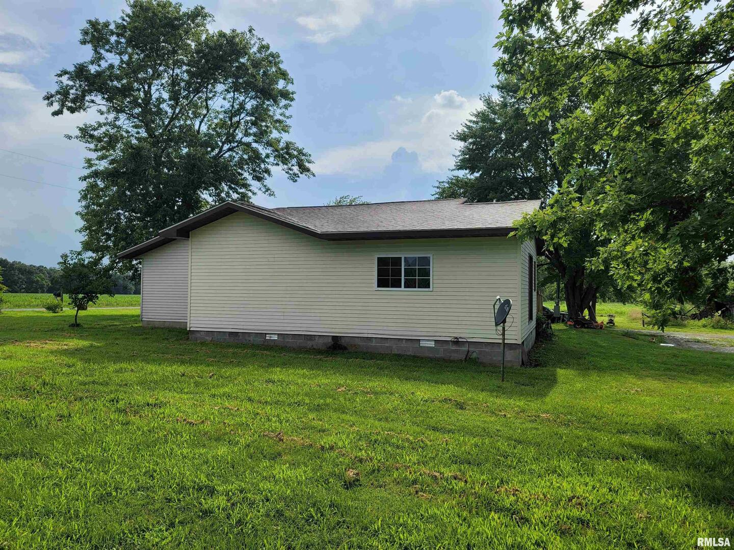 3993 Greenridge Road Alma, IL 62807 - Photo 44 of 45 a backyard of a house with lots of green space