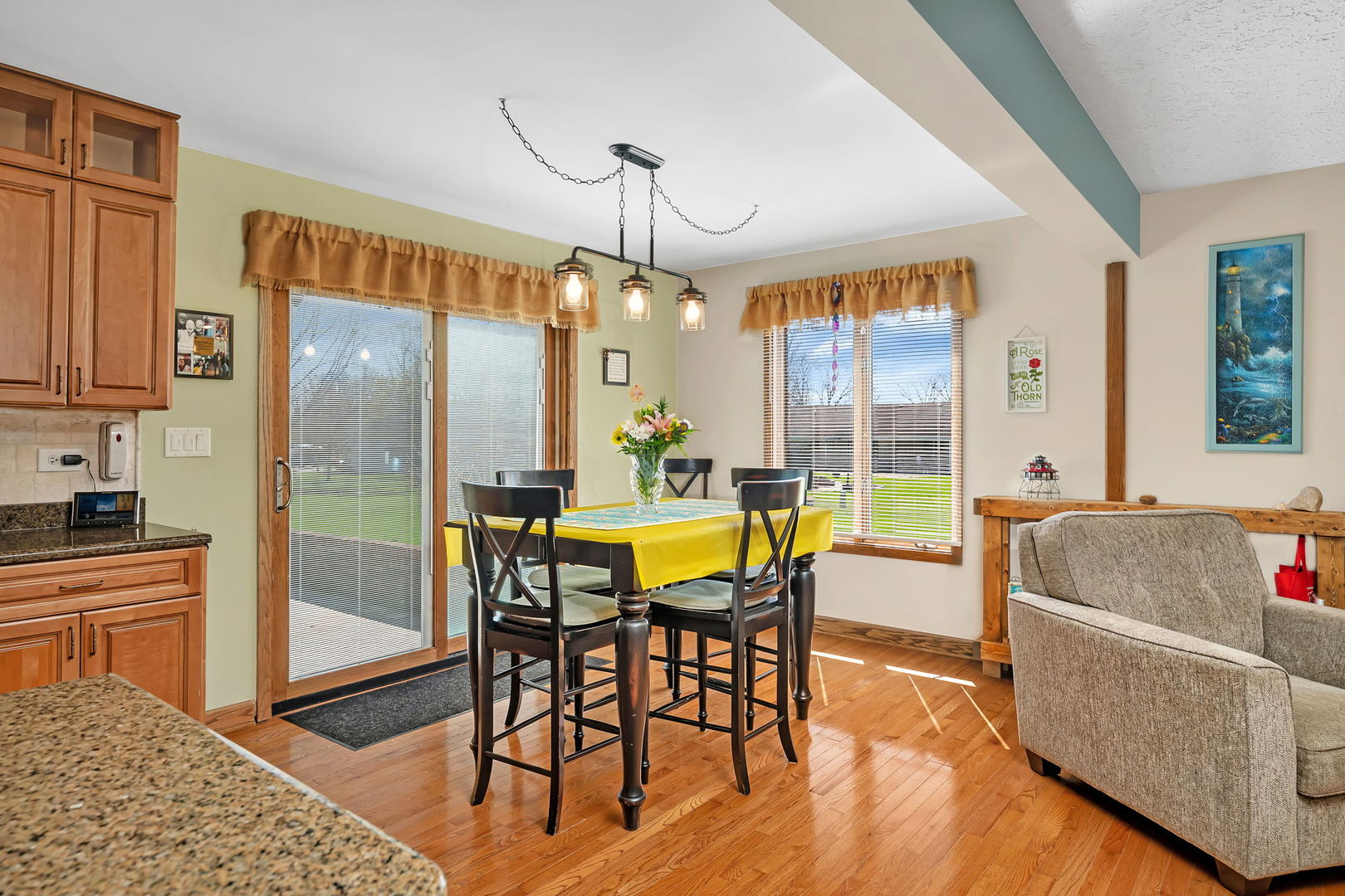108 Deerpath Drive Minooka, IL 60447 - Photo 11 of 45 a view of a dining room with furniture window and wooden floor