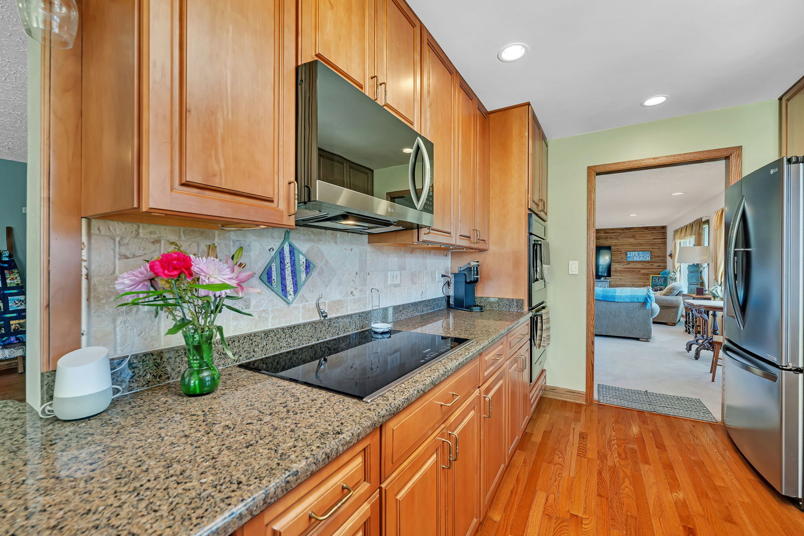108 Deerpath Drive Minooka, IL 60447 - Photo 14 of 45 a kitchen with a sink and a microwave