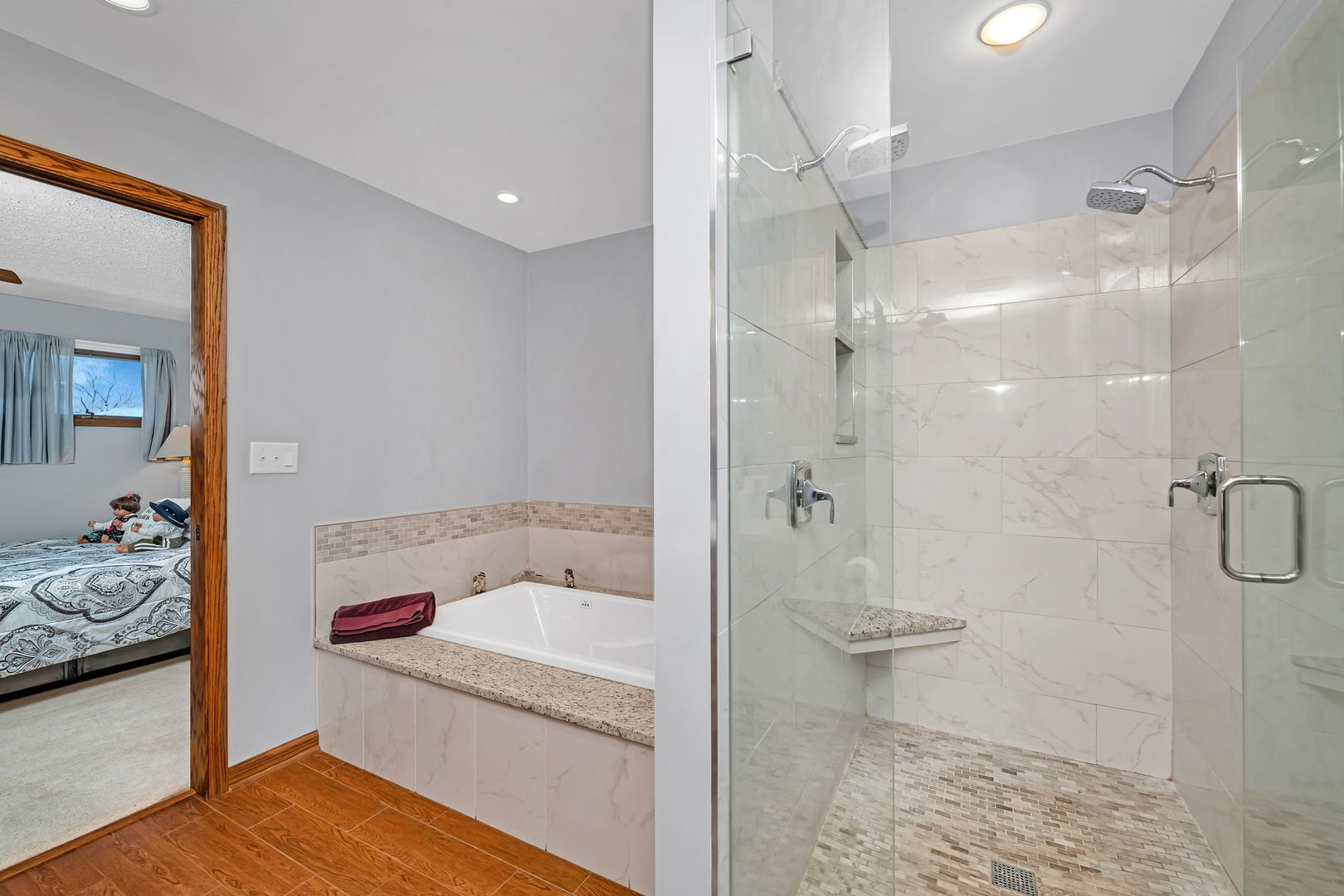 108 Deerpath Drive Minooka, IL 60447 - Photo 20 of 45 a bathroom with a tub sink and shower