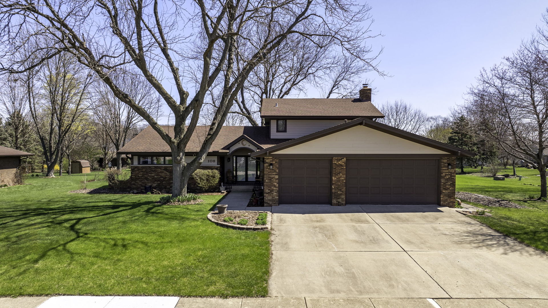 108 Deerpath Drive Minooka, IL 60447 - Photo 38 of 45 a front view of house with yard and green space