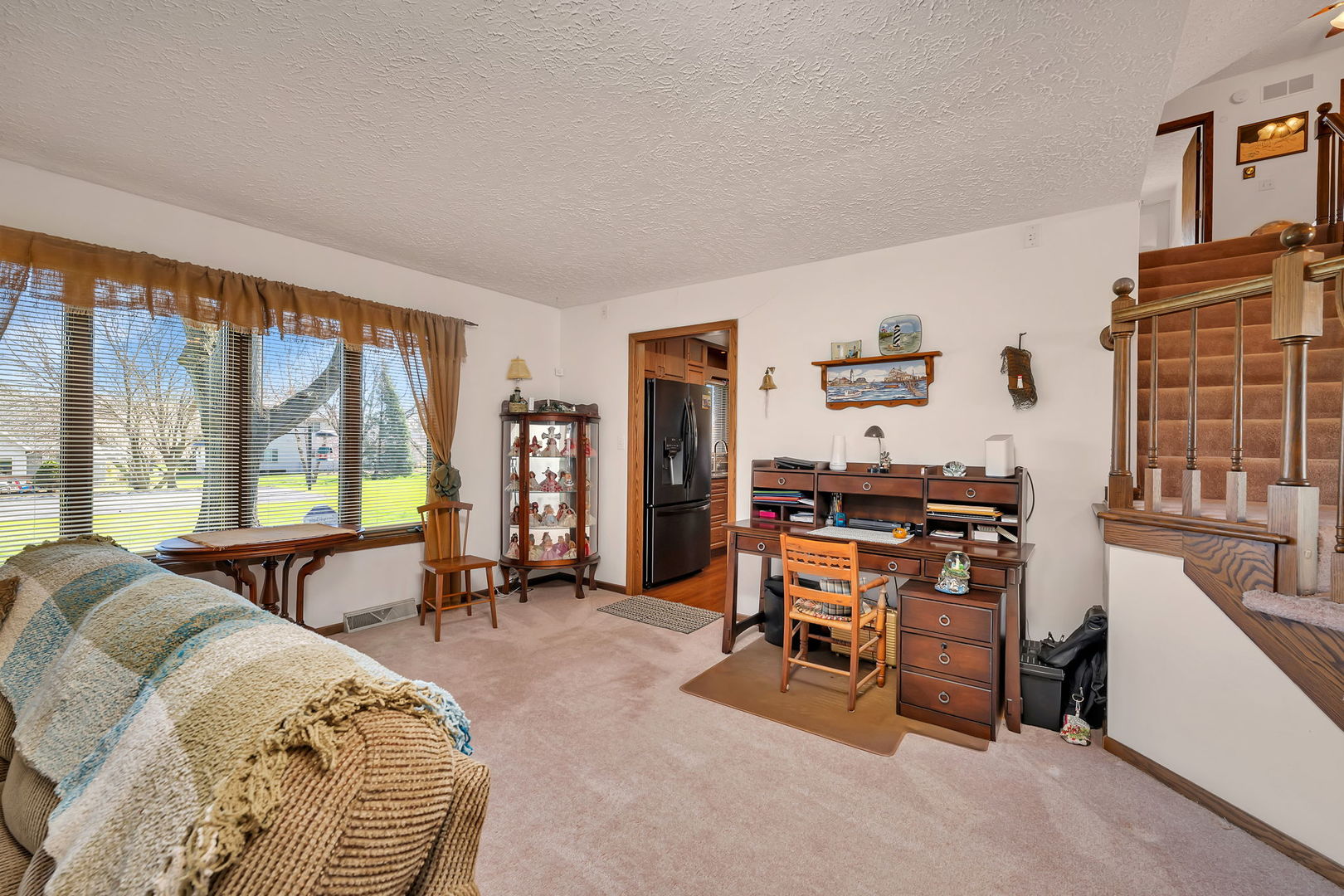 108 Deerpath Drive Minooka, IL 60447 - Photo 6 of 45 a living room with furniture and a large window