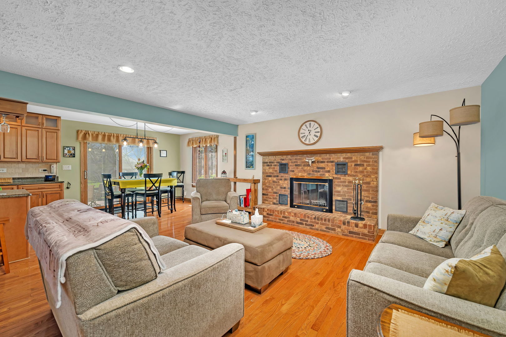 108 Deerpath Drive Minooka, IL 60447 - Photo 9 of 45 a living room with furniture and a fireplace