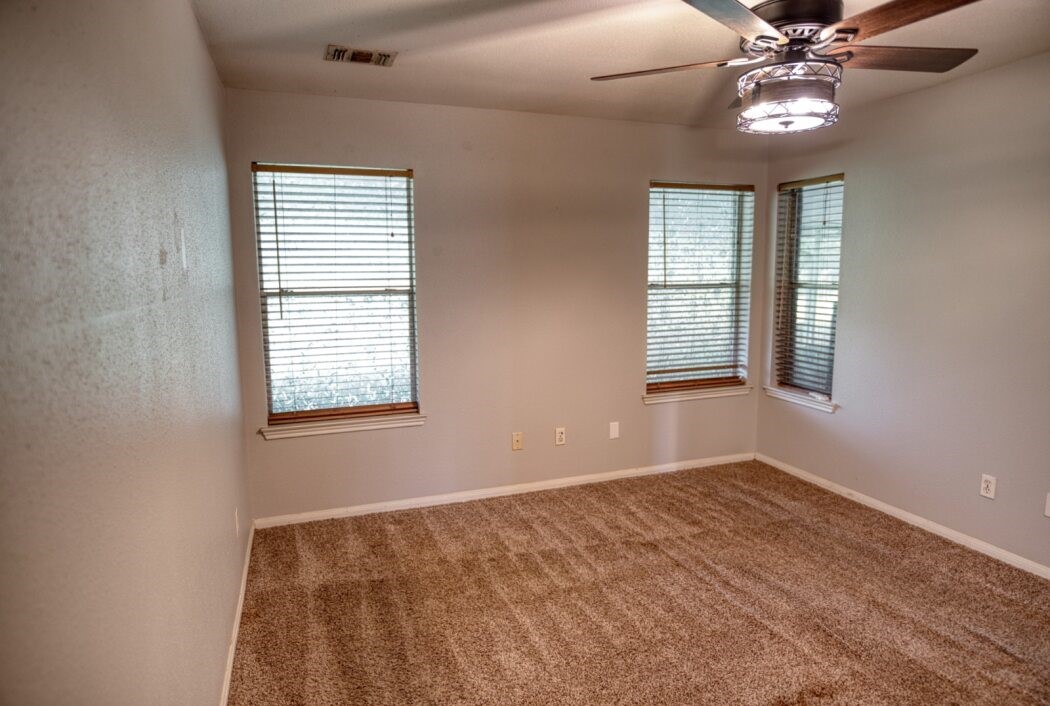 308 County Road 893B Angleton, TX 77515 - Photo 31 of 41 a view of an empty room with a window