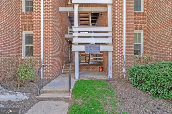a front view of a house with a porch