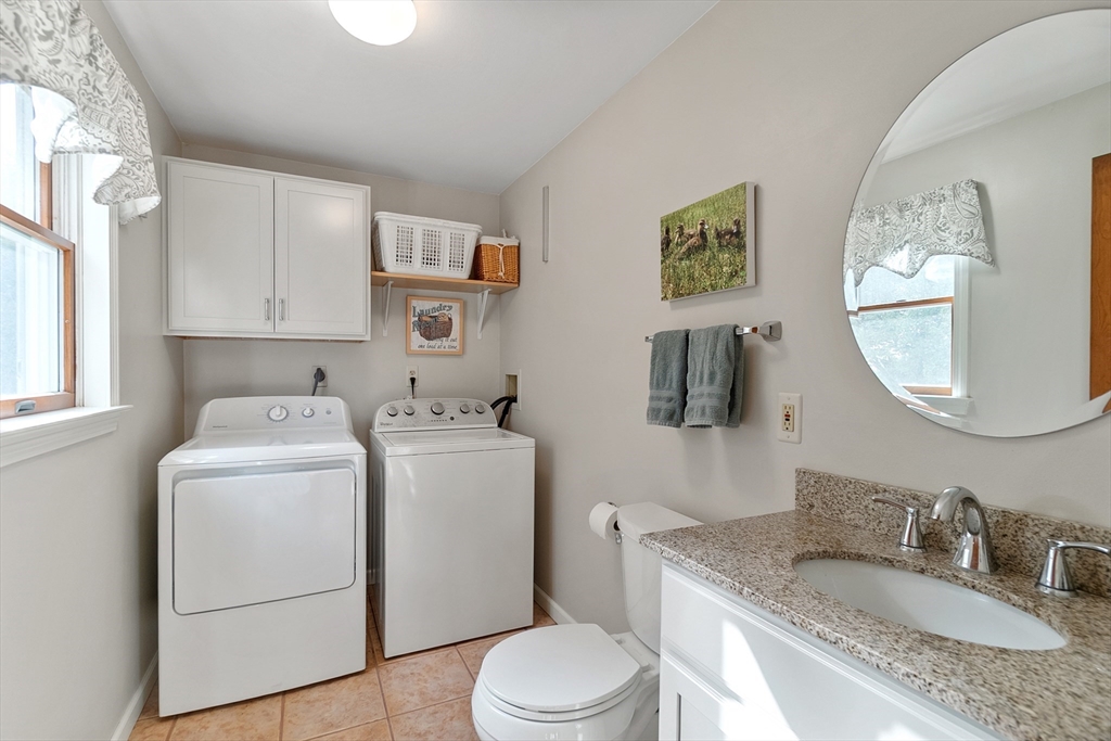 64 Apple Ridge Road West Springfield, MA 01089 - Photo 16 of 31 a bathroom with a granite countertop sink mirror vanity and toilet