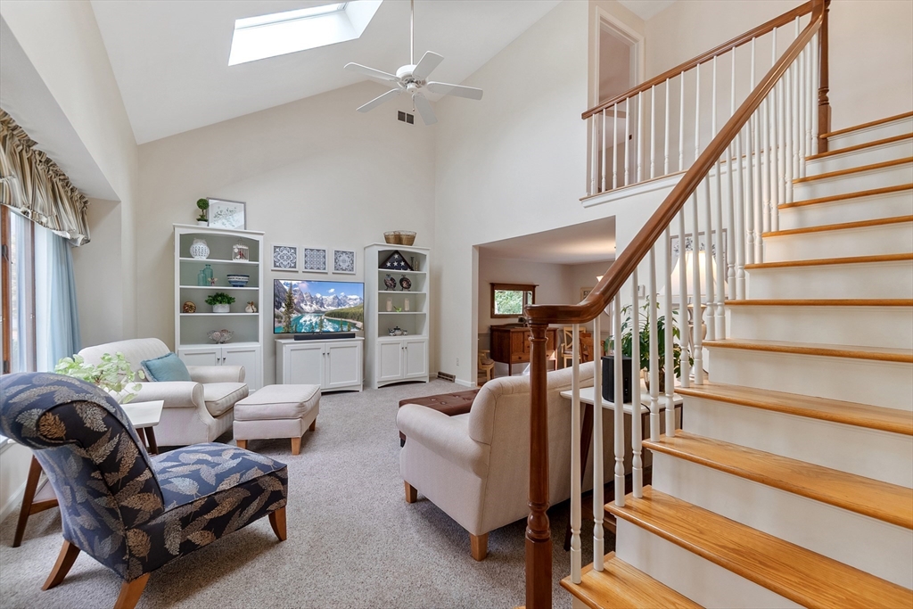 64 Apple Ridge Road West Springfield, MA 01089 - Photo 4 of 31 a living room with furniture and stairs