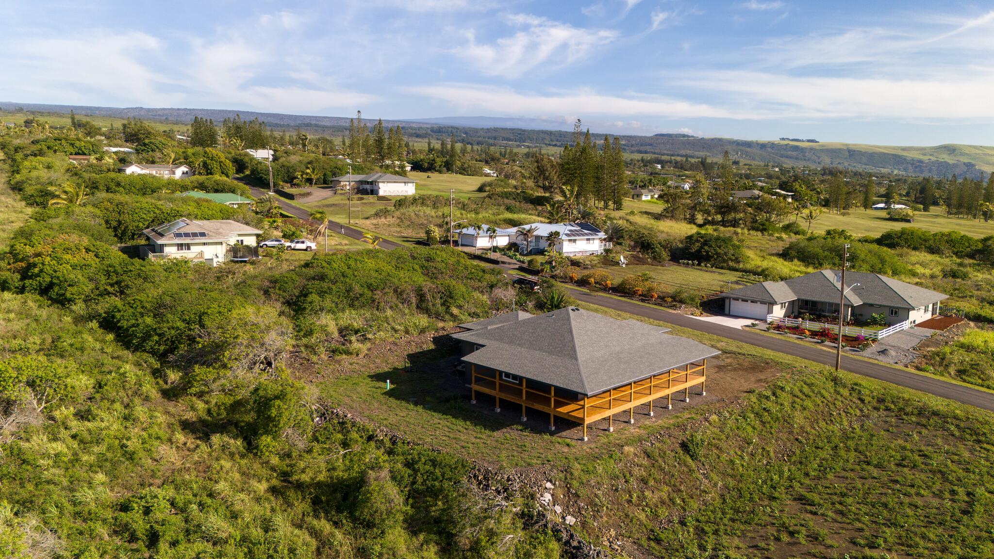94-1549 Ha'Eha'e Street Naalehu, HI 96772 - Photo 30 of 30 an aerial view of residential houses with outdoor space