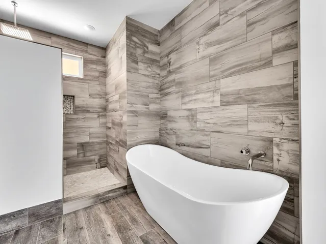 a view of a bathtub in a bathroom