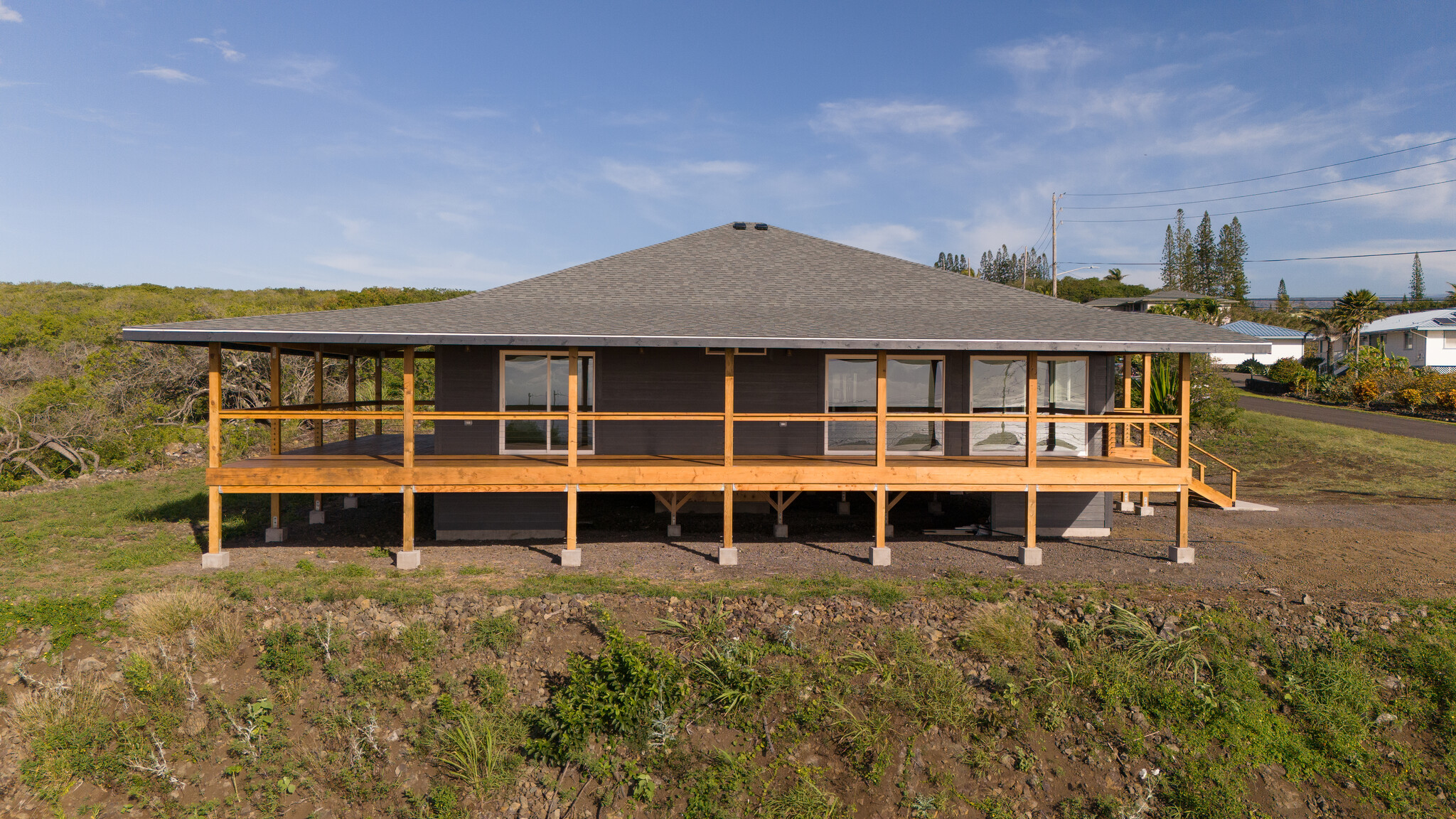 94-1549 Ha'Eha'e Street Naalehu, HI 96772 - Photo 7 of 30 a house view with a garden space