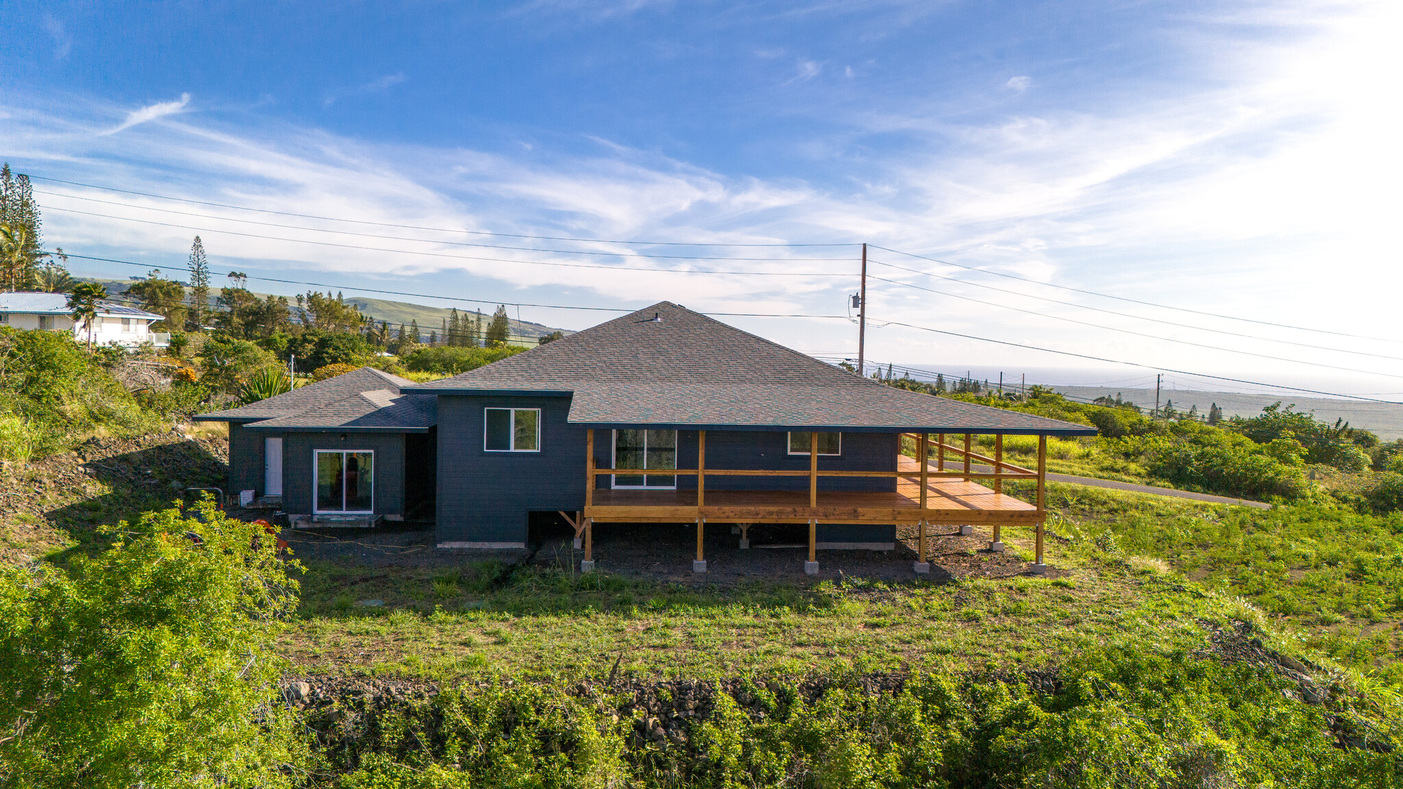 94-1549 Ha'Eha'e Street Naalehu, HI 96772 - Photo 9 of 30 front view of a house with a yard