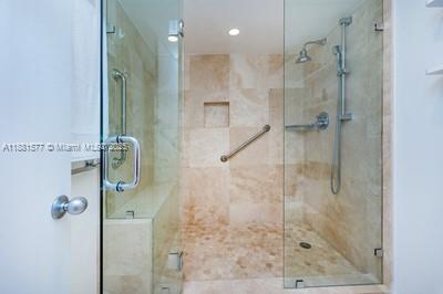 609 Ocean Drive, Unit 8G Key Biscayne, FL 33149 - Photo 22 of 44 a bathroom with a shower