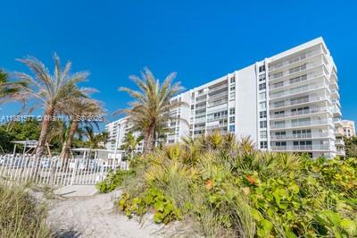 609 Ocean Drive, Unit 8G Key Biscayne, FL 33149 - Photo 34 of 44 a view of a tall building