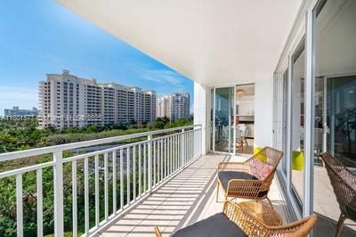 609 Ocean Drive, Unit 8G Key Biscayne, FL 33149 - Photo 43 of 44 a view of balcony with furniture