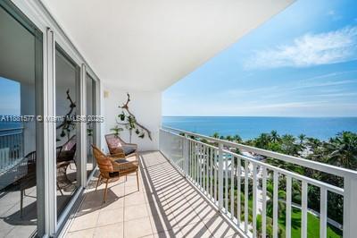 609 Ocean Drive, Unit 8G Key Biscayne, FL 33149 - Photo 9 of 44 a view of balcony with furniture