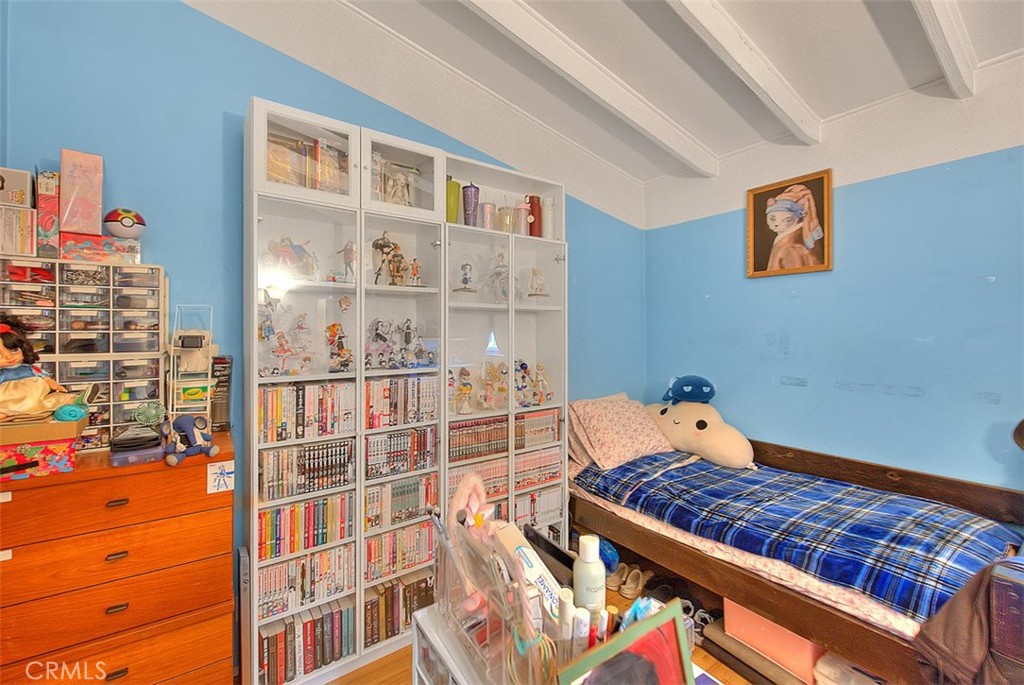 8651 Encinitas Avenue Fontana, CA 92335 - Photo 15 of 35 a bed room with a bed and a window