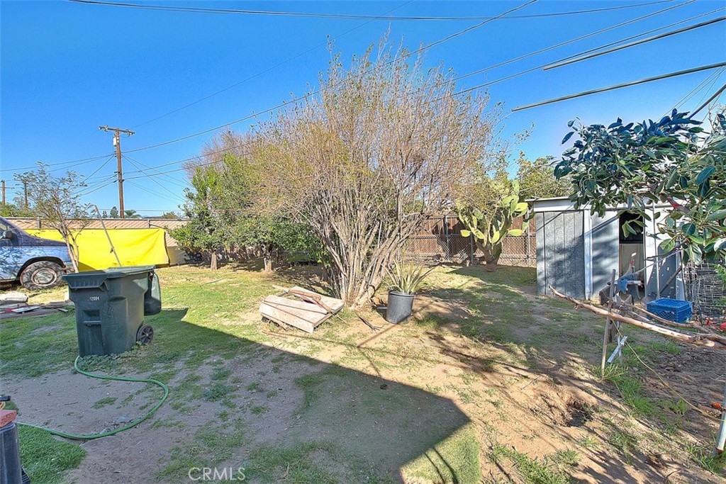 8651 Encinitas Avenue Fontana, CA 92335 - Photo 27 of 35 a view of a house with a yard