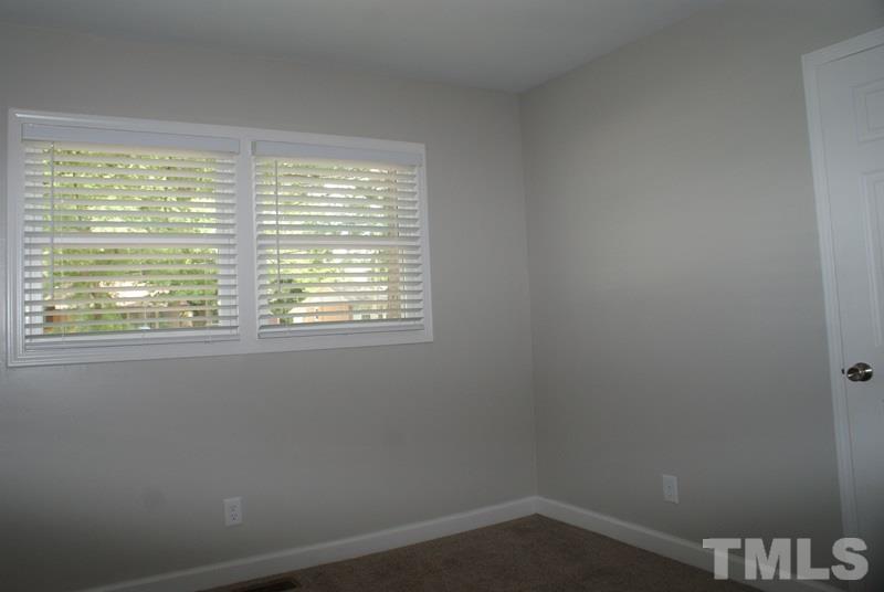 504 Cooper Road Raleigh, NC 27610 - Photo 13 of 21 a small space with a window