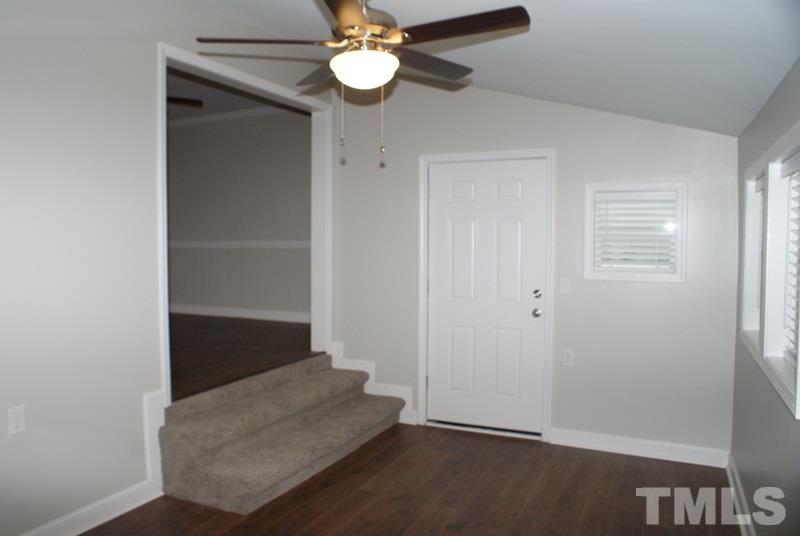 504 Cooper Road Raleigh, NC 27610 - Photo 15 of 21 wooden floor in an empty room