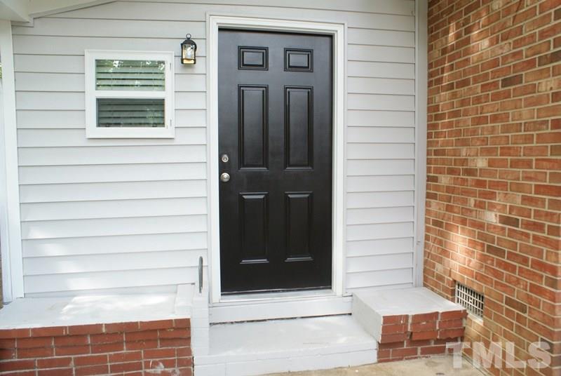 504 Cooper Road Raleigh, NC 27610 - Photo 18 of 21 a view of front door of house