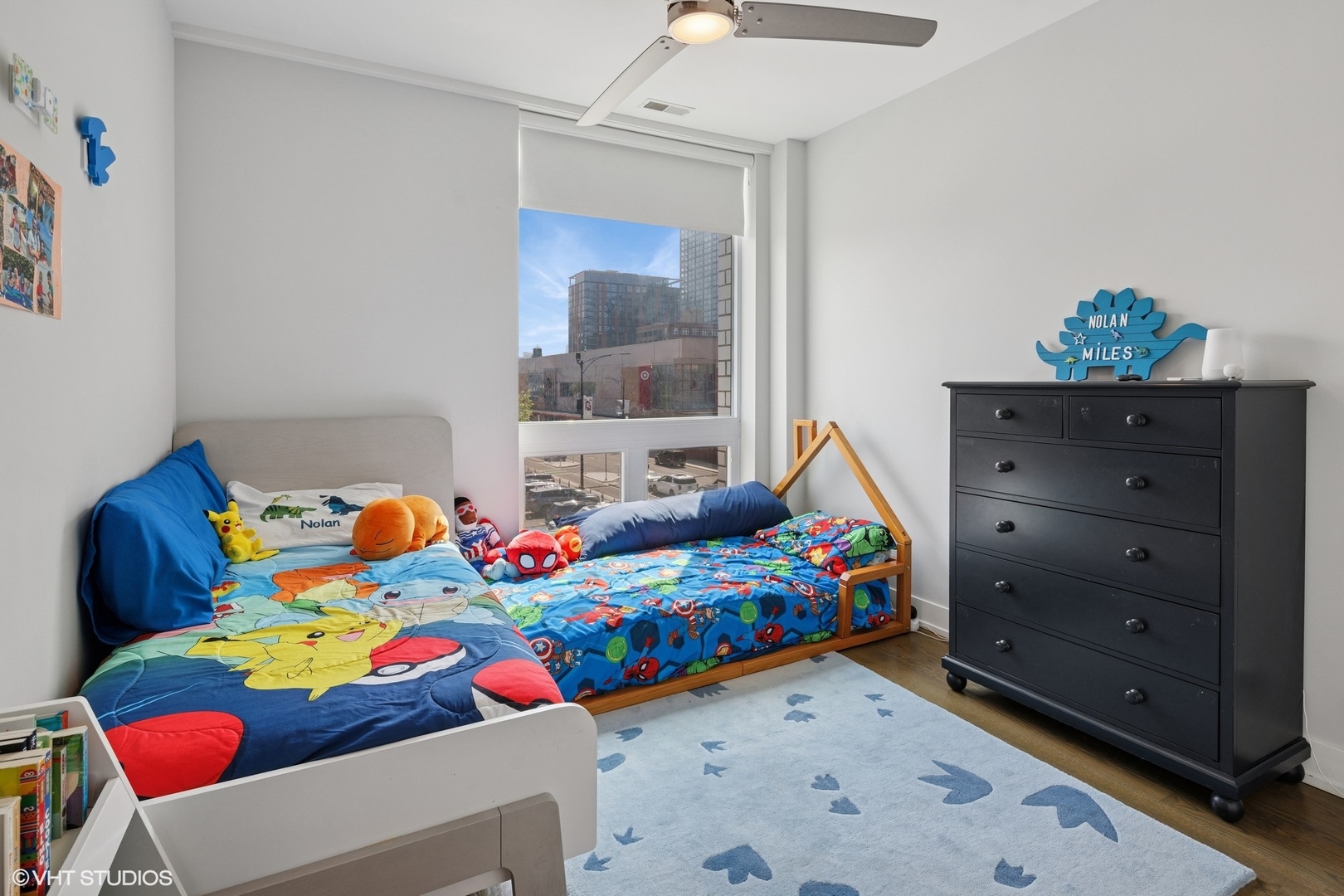 236 South Racine Avenue, Unit 304 Chicago, IL 60607 - Photo 13 of 19 a bedroom with baby bed and window