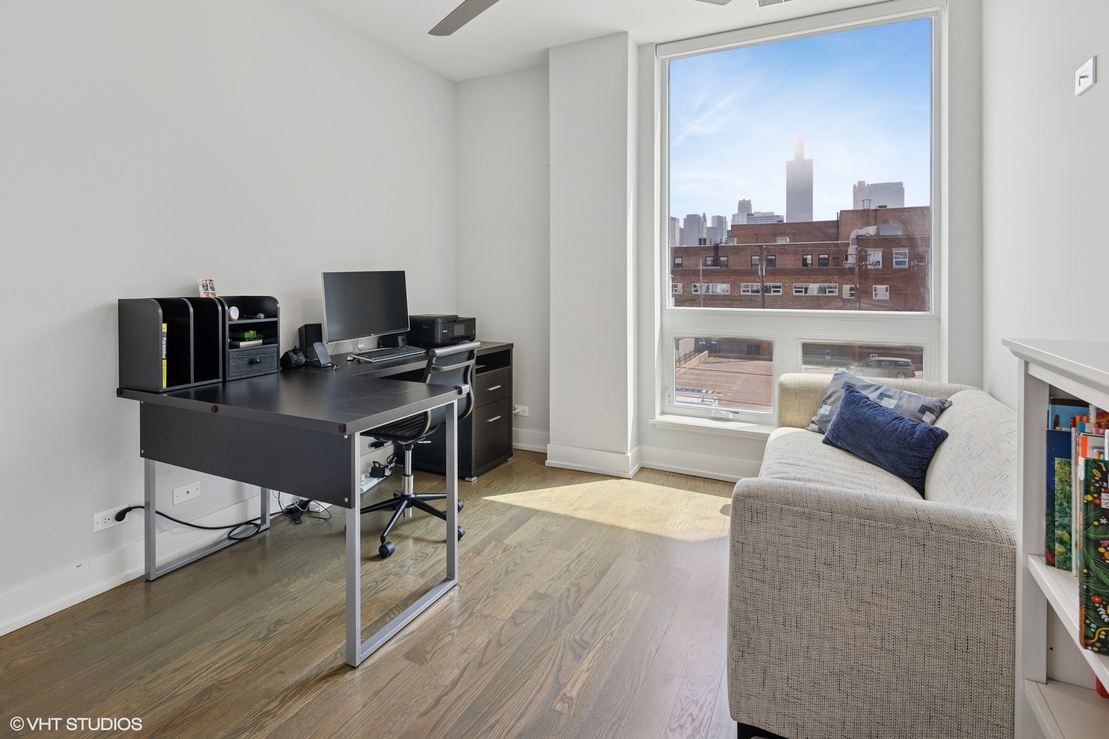 236 South Racine Avenue, Unit 304 Chicago, IL 60607 - Photo 14 of 19 a living room with furniture and a wooden floor