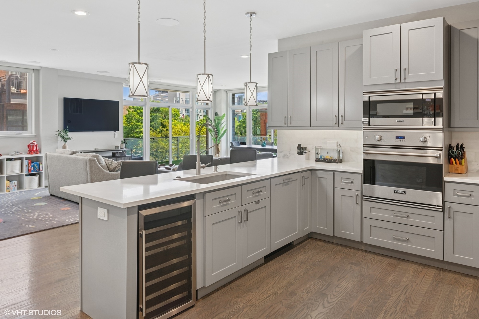 236 South Racine Avenue, Unit 304 Chicago, IL 60607 - Photo 9 of 19 a kitchen with stainless steel appliances granite countertop a sink a stove and a refrigerator