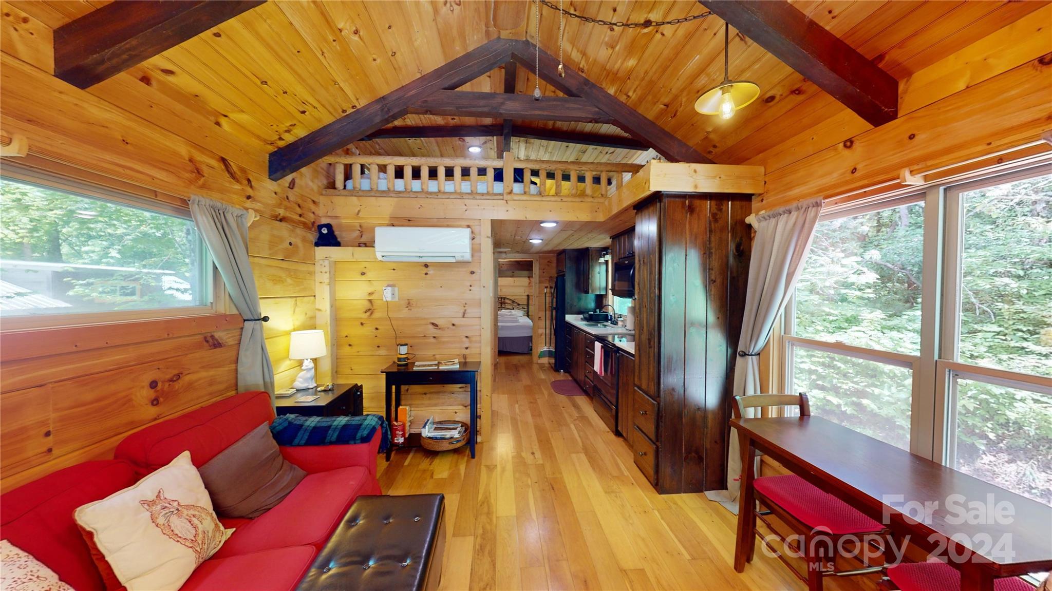 78 Smiling Fox Trail Brevard, NC 28712 - Photo 18 of 22 a view of a living room with a large window