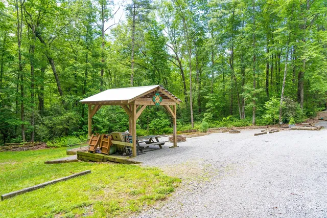 a view of a swimming pool with a patio
