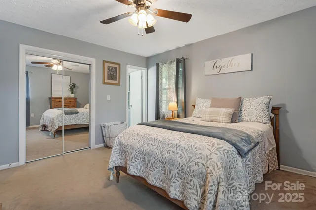 a bedroom with a bed and furniture