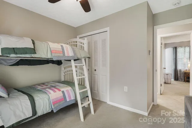 a living room with furniture a window and a fireplace