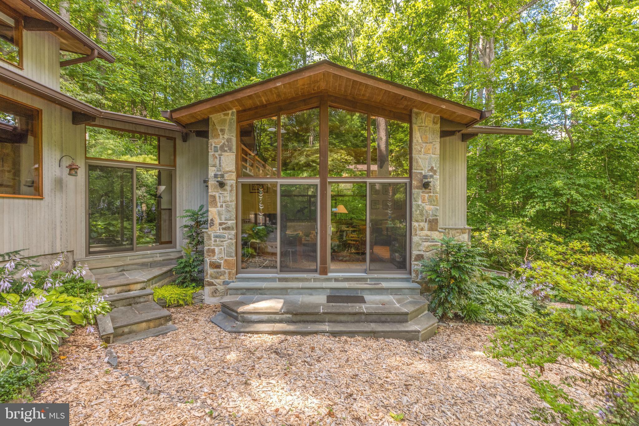 9520 Sagamore Spring Road Great Falls, VA 22066 - Photo 5 of 106 Addition with views./doors to garden w/pond