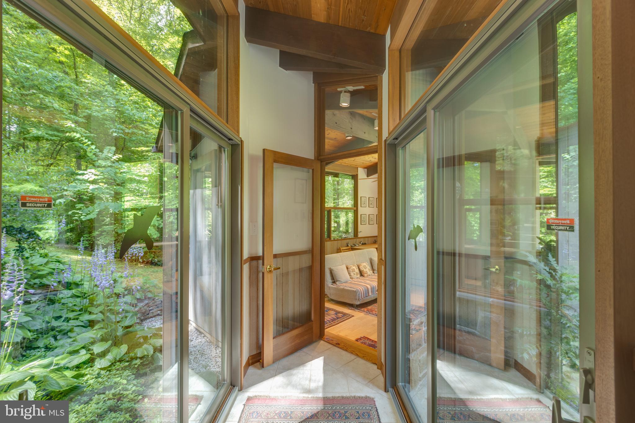 9520 Sagamore Spring Road Great Falls, VA 22066 - Photo 57 of 106 2 XL Glass Sliding Doors lead to Pond & Paths