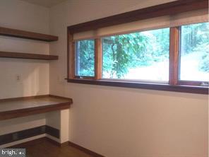 9520 Sagamore Spring Road Great Falls, VA 22066 - Photo 98 of 106 Guest /Desk/Built in with view of Entrance/drive