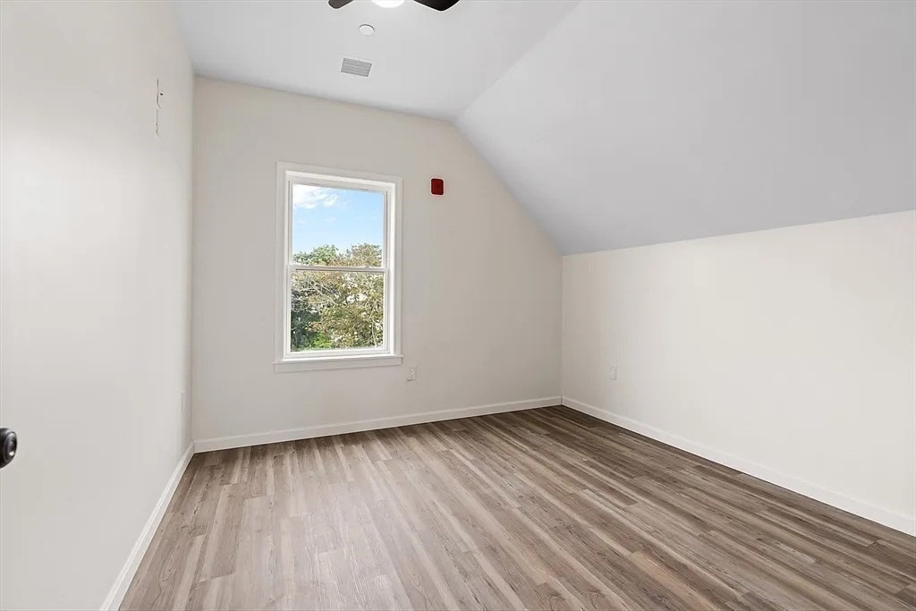 20 Graham Street, Unit 4 Gardner, MA 01440 - Photo 12 of 23 a view of room with window and hardwood floor