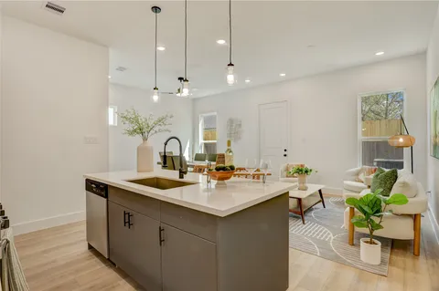 a room with a sink and a table