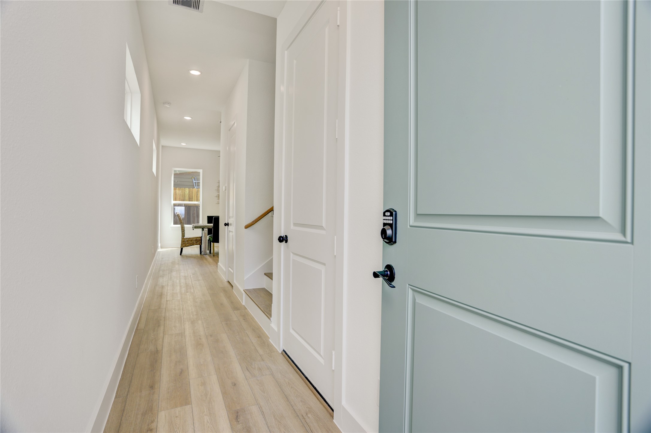 9604 Burden Street Houston, TX 77093 - Photo 8 of 28 Upon entering, the home has a long gallery hallway - perfect for displaying artwork.