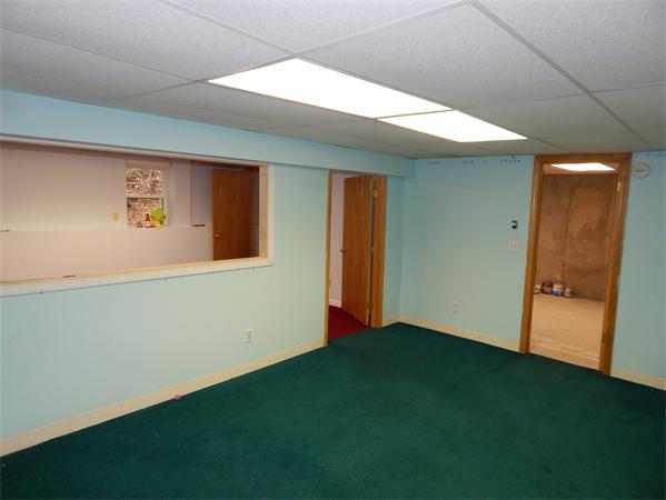 19 Wrentham Road Worcester, MA 01602 - Photo 11 of 12 a view of an empty room with closet