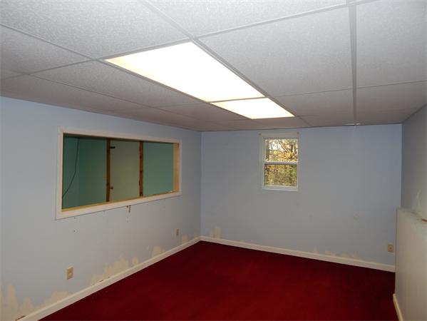19 Wrentham Road Worcester, MA 01602 - Photo 12 of 12 an empty room with a window